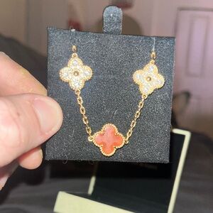 Elegant Gold and Coral Clover Necklace